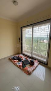 Bedroom Image of 550 Sq.ft 1 BHK Apartment / Flat for rent in Arihant Aarohi, Shilgaon Thane for Rs. 15000