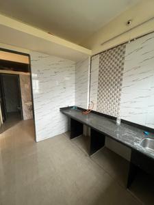 Kitchen Image of 1030 Sq.ft 2 BHK Apartment / Flat for rent in Mohan Willows I, Badlapur East Badlapur for Rs. 11500