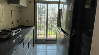 Kitchen Image of 980 Sq.ft 1.5 BHK Apartment / Flat for rent in Gajra Bhoomi Gardenia, Kalamboli Navi Mumbai for Rs. 28000