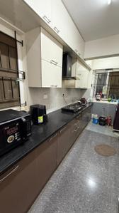 Kitchen Image of 1200 Sq.ft 2 BHK Builder Floor for rent in Sarjapur Bengaluru for Rs. 55000