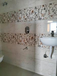 Common Bathroom Image of 550 Sq.ft 1 BHK Apartment / Flat for sale in Mulund East Mumbai for Rs. 9100000