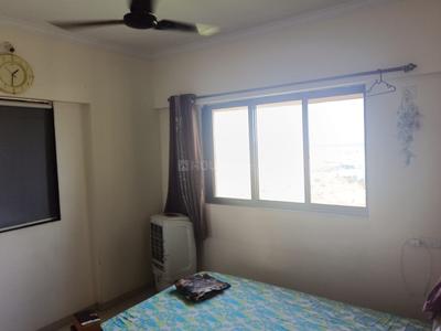 Bedroom Image of 606 Sq.ft 1 BHK Apartment / Flat for sale in Raunak Unnathi Woods, Kasarvadavali Thane for Rs. 6200000