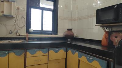 Kitchen Image of 700 Sq.ft 1 BHK Apartment / Flat for sale in Anand Vihar Complex, Kalwa Thane for Rs. 7000000