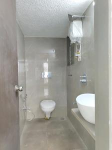 Common Bathroom Image of 650 Sq.ft 1 BHK Apartment / Flat for sale in Mansarovar Pearl Gardens, Vasai West Vasai for Rs. 5400000