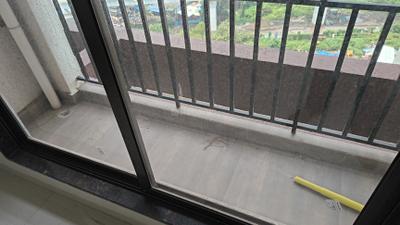 Balcony Image of 690 Sq.ft 1 BHK Apartment / Flat for rent in Shilphata Thane for Rs. 14000