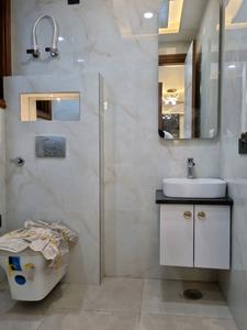 Common Bathroom Image of 1000 Sq.ft 3 BHK Apartment / Flat for sale in Dwarka Mor New Delhi for Rs. 8200000