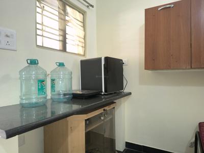 Kitchen Image of 175 Sq.ft 1 RK Independent House for rent in Domlur Layout Bengaluru for Rs. 15500