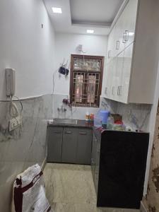 Kitchen Image of 700 Sq.ft 2 BHK Builder Floor for rent in Sector 11 Rohini New Delhi for Rs. 20000