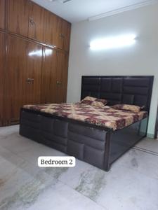 Bedroom Image of 1000 Sq.ft 2 BHK Builder Floor for rent in Lajpat Nagar New Delhi for Rs. 60000