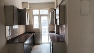 Kitchen Image of 1300 Sq.ft 3 BHK Apartment / Flat for rent in Amrapali Zodiac, Sector 120 Noida for Rs. 30000