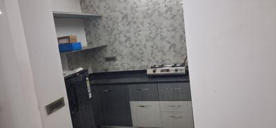 Kitchen Image of 1305 Sq.ft 2 BHK Apartment / Flat for rent in Swagat Queens Land, Sargasan Gandhinagar for Rs. 35000