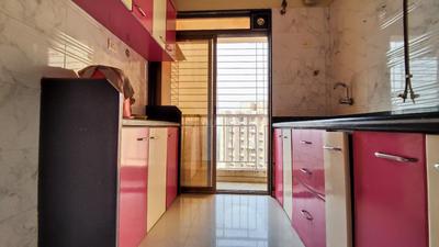 Kitchen Image of 670 Sq.ft 1 BHK Apartment / Flat for sale in Om Prabhu Manohar CHS, Seawoods Navi Mumbai for Rs. 12500000