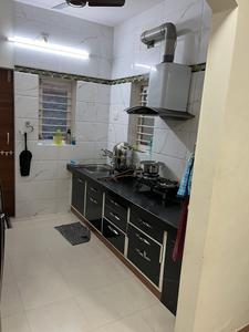 Kitchen Image of 1260 Sq.ft 3 BHK Villa for rent in  Abhishek Bungalows, Bhat Ahmedabad for Rs. 38000