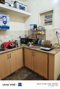 Kitchen Image of 800 Sq.ft 2 BHK Apartment / Flat for rent in Halasuru Bengaluru for Rs. 30000