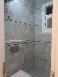 Common Bathroom Image of 590 Sq.ft 2 BHK Builder Floor for sale in Mahavir Enclave New Delhi for Rs. 5000000