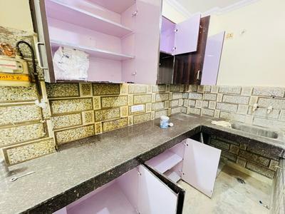 Kitchen Image of 650 Sq.ft 2 BHK Builder Floor for rent in Hastsal New Delhi for Rs. 9000