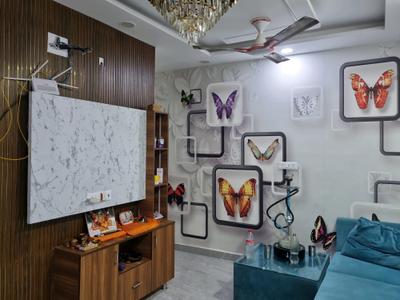 Living Room Image of 630 Sq.ft 2 BHK Builder Floor for rent in Dwarka Mor New Delhi for Rs. 23500