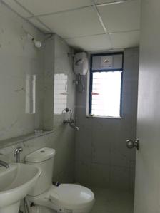 Common Bathroom Image of 658 Sq.ft 1 BHK Apartment / Flat for sale in Runwal Gardens Phase 3 Bldg No 24 To 26, Dombivli East Thane for Rs. 4800000