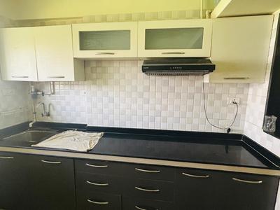Kitchen Image of 650 Sq.ft 1 BHK Apartment / Flat for sale in Charms Paradise, Titwala Thane for Rs. 2700000