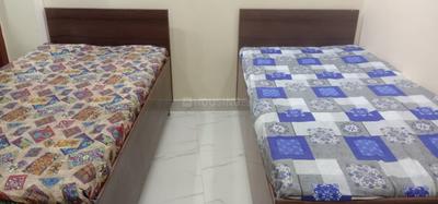 Bedroom Image of Saini PG  in Sunlight Colony, New Delhi