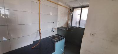 Kitchen Image of 640 Sq.ft 1 BHK Apartment / Flat for rent in Savvy Studioz, Gota Ahmedabad for Rs. 18000
