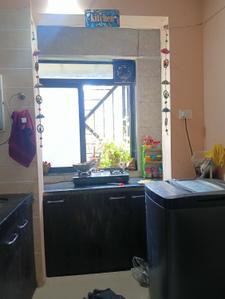 Kitchen Image of 865 Sq.ft 2 BHK Apartment / Flat for sale in Tharwani Ritu World, Badlapur West Badlapur for Rs. 3500000