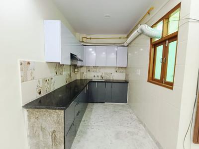 Kitchen Image of 1200 Sq.ft 2 BHK Builder Floor for rent in Vivek Vihar New Delhi for Rs. 35000
