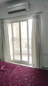Bedroom Image of 500 Sq.ft 1 RK Apartment / Flat for rent in Ajnara Elements, Sector 137 Noida for Rs. 22500