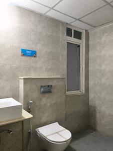 Common Bathroom Image of 1401 Sq.ft 2 BHK Apartment / Flat for sale in Kolte Patil Little Earth Kiwale Building C16, Mamurdi Pune for Rs. 10500000