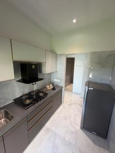 Kitchen Image of 853 Sq.ft 2 BHK Apartment / Flat for sale in Codename Upvan, Kharghar Navi Mumbai for Rs. 6900000