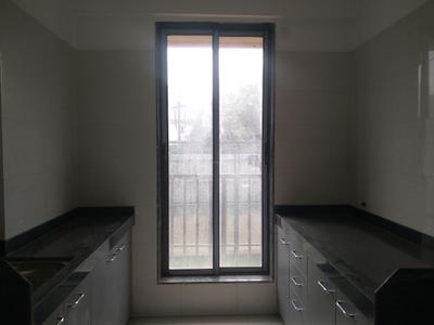 Kitchen Image of 690 Sq.ft 1 BHK Apartment / Flat for sale in Wonder Park, Fatherwadi Vasai for Rs. 3700000