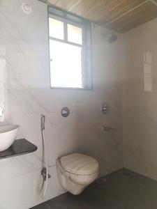 Common Bathroom Image of 1060 Sq.ft 2 BHK Apartment / Flat for sale in Gulmohar Primrose, Wagholi Pune for Rs. 6500000