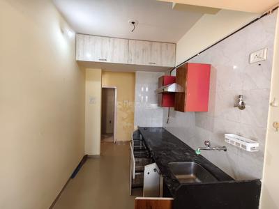 Kitchen Image of 550 Sq.ft 1 BHK Apartment / Flat for sale in Puraniks Home Town, Kasarvadavali Thane for Rs. 5450000