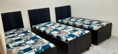 Bedroom Image of friends pg in Sector 15, Noida