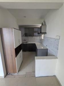 Kitchen Image of 900 Sq.ft 2 BHK Apartment / Flat for rent in Unitech Uniworld Gardens 2, Sector 47 Gurgaon for Rs. 36000