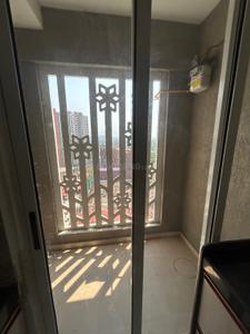 Balcony Image of 670 Sq.ft 1 BHK Apartment / Flat for rent in Lodha Palava Premier, Dombivli East Thane for Rs. 17000