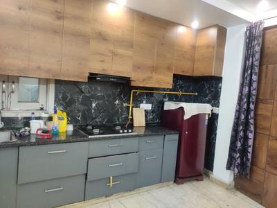 Kitchen Image of 900 Sq.ft 2 BHK Builder Floor for rent in Ramesh Nagar New Delhi for Rs. 30000