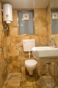 Bathroom Image of 725 Sq.ft 1 BHK Apartment / Flat for sale in Nova Galaxy, Palanpur Surat for Rs. 2700000