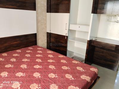 Bedroom Image of 1310 Sq.ft 2 BHK Apartment / Flat for rent in Happy Home Nandanvan 3, Vesu Surat for Rs. 32000