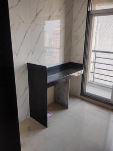 Kitchen Image of 690 Sq.ft 1 BHK Apartment / Flat for sale in Gajra Bhoomi Lawns, Shilgaon Thane for Rs. 3800000