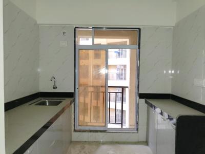 Kitchen Image of 705 Sq.ft 1 BHK Apartment / Flat for sale in Munish Emonics Tower, Vasai East Vasai for Rs. 3900000