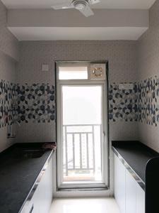 Kitchen Image of 450 Sq.ft 1 BHK Apartment / Flat for rent in Raunak Bliss, Kasarvadavali Thane for Rs. 26000