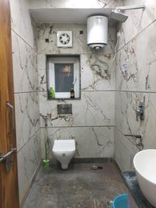 Common Bathroom Image of 360 Sq.ft 1 RK Apartment / Flat for rent in DLF Capital Greens by DLF, Karampura New Delhi for Rs. 25000