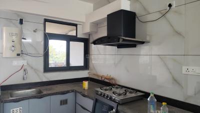 Kitchen Image of 1125 Sq.ft 3 BHK Apartment / Flat for rent in Royal Revanta 3, Kudasan Gandhinagar for Rs. 45000