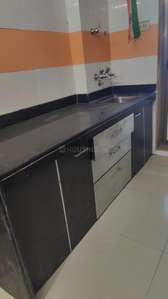 Kitchen Image of 980 Sq.ft 2 BHK Apartment / Flat for rent in Strawberry Sandstone, Mira Road East Mira Bhayandar for Rs. 25000