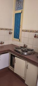 Kitchen Image of 950 Sq.ft 1 BHK Builder Floor for rent in Gamma II Greater Noida for Rs. 18000