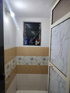Common Bathroom Image of 700 Sq.ft 1 BHK Apartment / Flat for rent in Puraniks Home Town E , Kasarvadavali Thane for Rs. 16502
