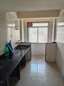 Kitchen Image of 936 Sq.ft 2 BHK Apartment / Flat for sale in Mohan Suburbia, Ambernath West Ambernath for Rs. 4100000