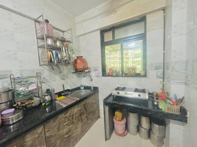 Kitchen Image of 675 Sq.ft 1 BHK Apartment / Flat for rent in Thakurli Thane for Rs. 15000