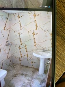 Bathroom Image of 1074 Sq.ft 3 BHK Apartment / Flat for sale in Migsun Vilaasa, Eta II Greater Noida for Rs. 8500000
